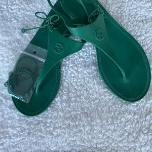 Gucci rubber sandals.